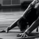 a woman in Downward Dog Pose